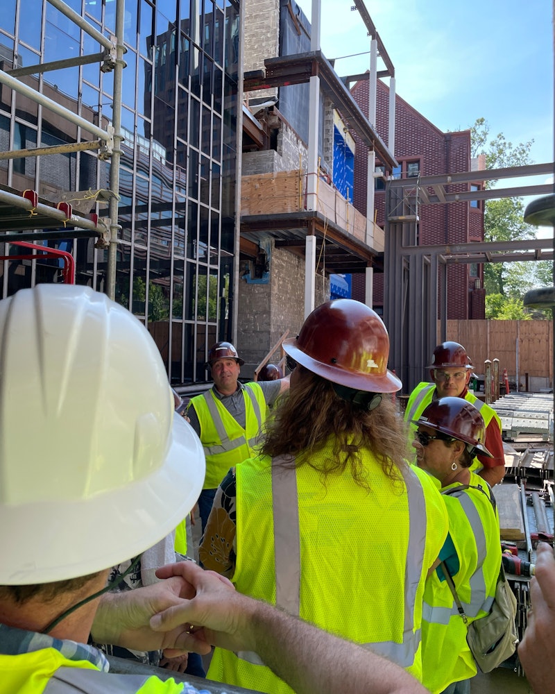 Andrew Santaniello gives a tour of the construction site.