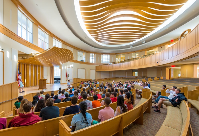 The auditorium at MICDS, with outdoor courtyard pictured above.