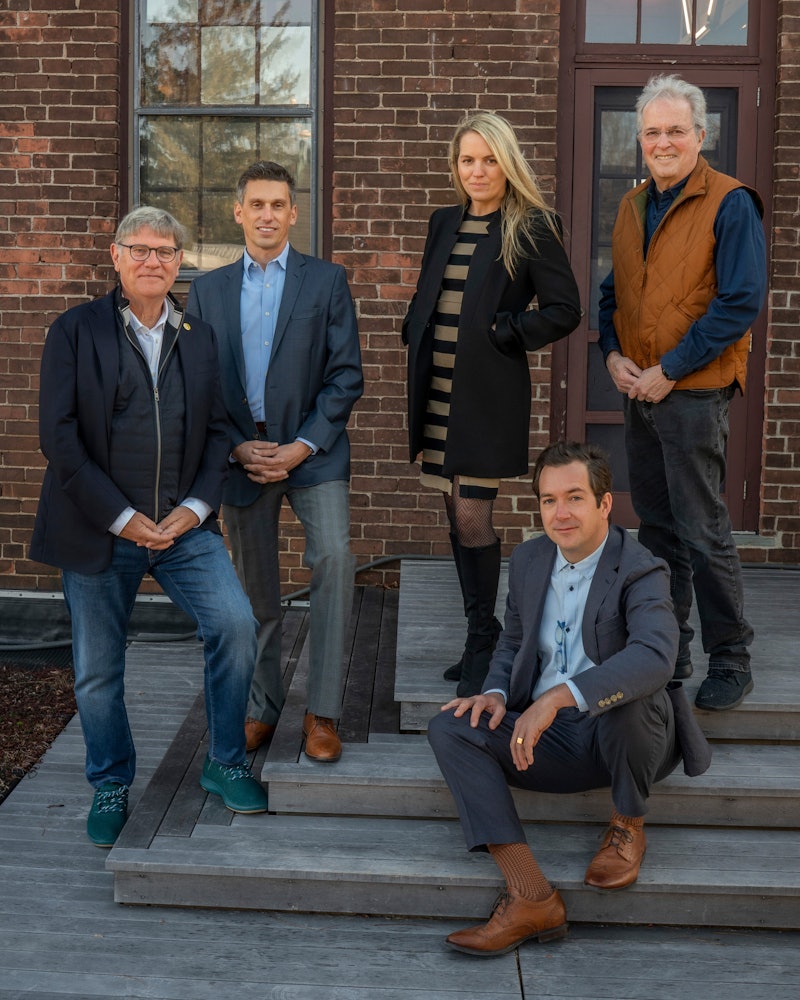 The Principals on our rooftop deck. From left to right: Jim Childress, Todd Andrews, Beth Hedde, Justin Hedde, and Mark Simon.