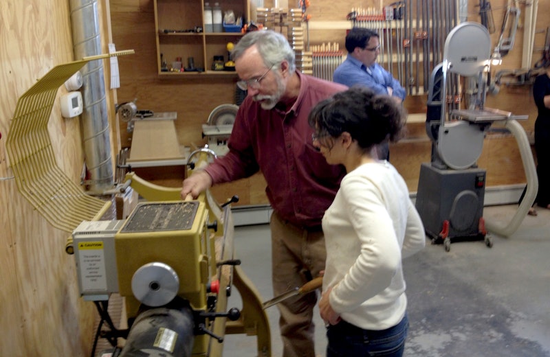 Bill Rutan helps Anna Shakun.